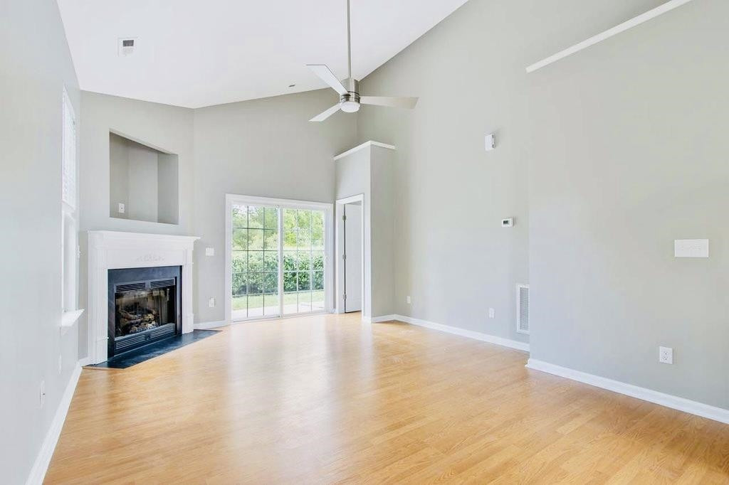 3609 Sugar Tree Place Durham, NC 27713 - Photo 13 of 22 a view of empty room with a fireplace and fan