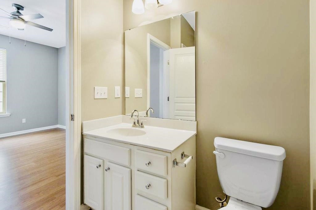 3609 Sugar Tree Place Durham, NC 27713 - Photo 14 of 22 a bathroom with a toilet sink and mirror