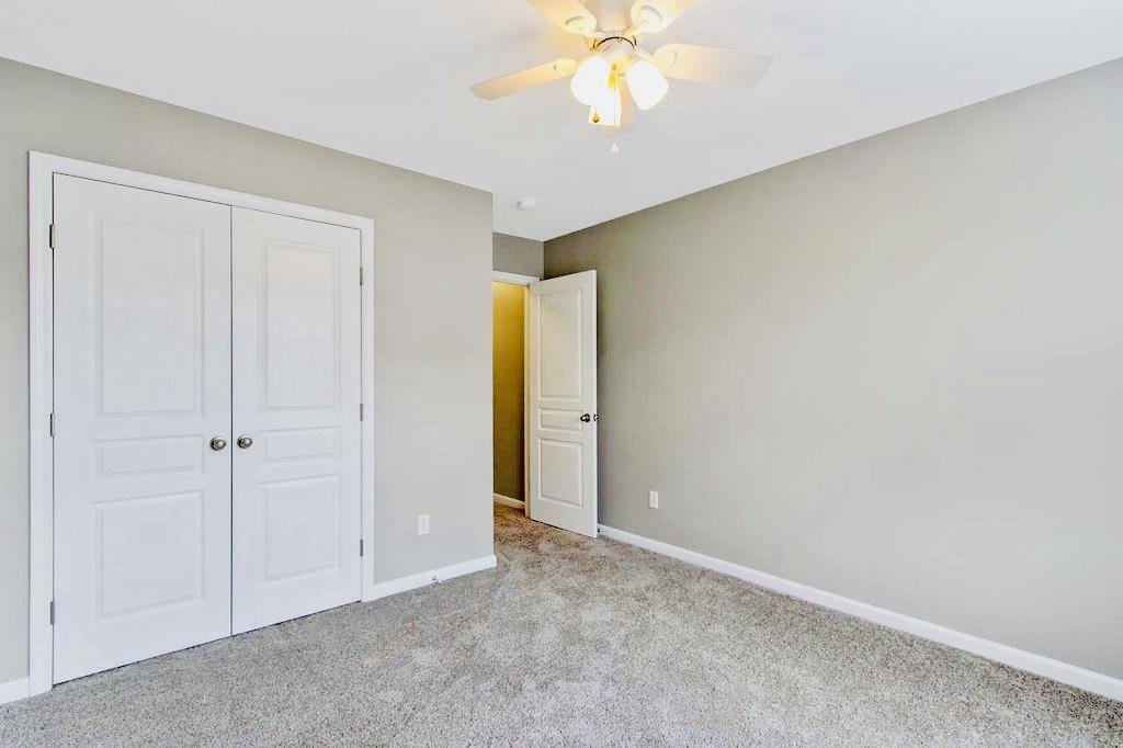 3609 Sugar Tree Place Durham, NC 27713 - Photo 17 of 22 a view of an empty room and chandelier fan
