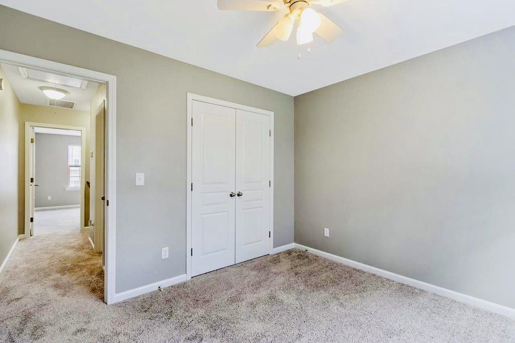 3609 Sugar Tree Place Durham, NC 27713 - Photo 21 of 22 a view of an empty room and chandelier fan