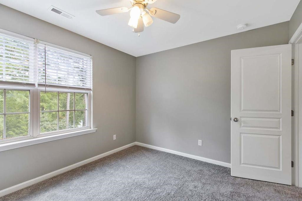 3609 Sugar Tree Place Durham, NC 27713 - Photo 22 of 22 an empty room with a window