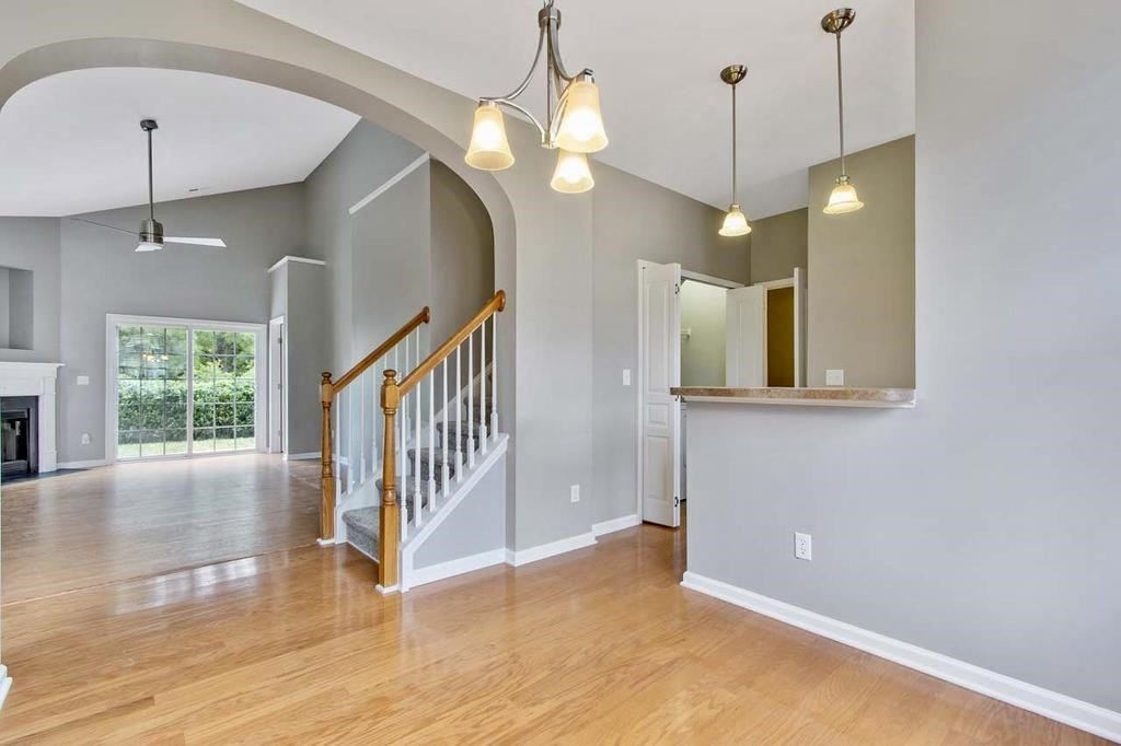 3609 Sugar Tree Place Durham, NC 27713 - Photo 7 of 22 a view of a hallway with wooden floor and entryway