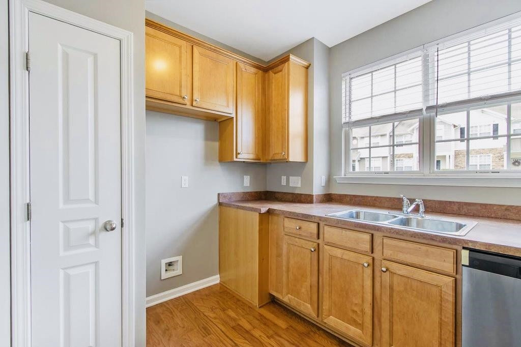 3609 Sugar Tree Place Durham, NC 27713 - Photo 8 of 22 a kitchen with a sink cabinets and window