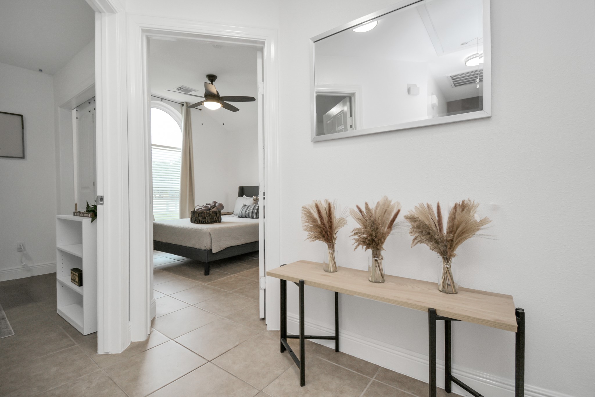 7830 Pardee Street Houston, TX 77028 - Photo 17 of 24 a living room with furniture and a chandelier
