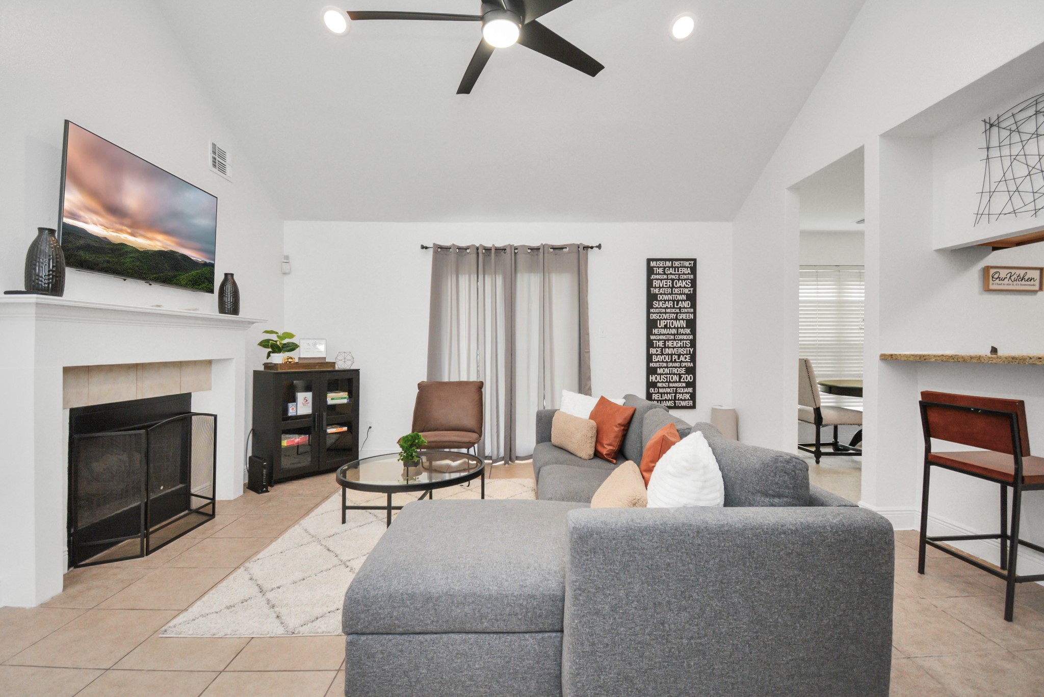 7830 Pardee Street Houston, TX 77028 - Photo 5 of 24 a living room with furniture and a fireplace