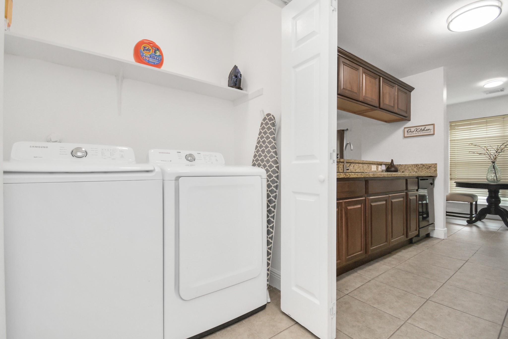 7830 Pardee Street Houston, TX 77028 - Photo 9 of 24 a view of a storage & utility room with washer and dryer