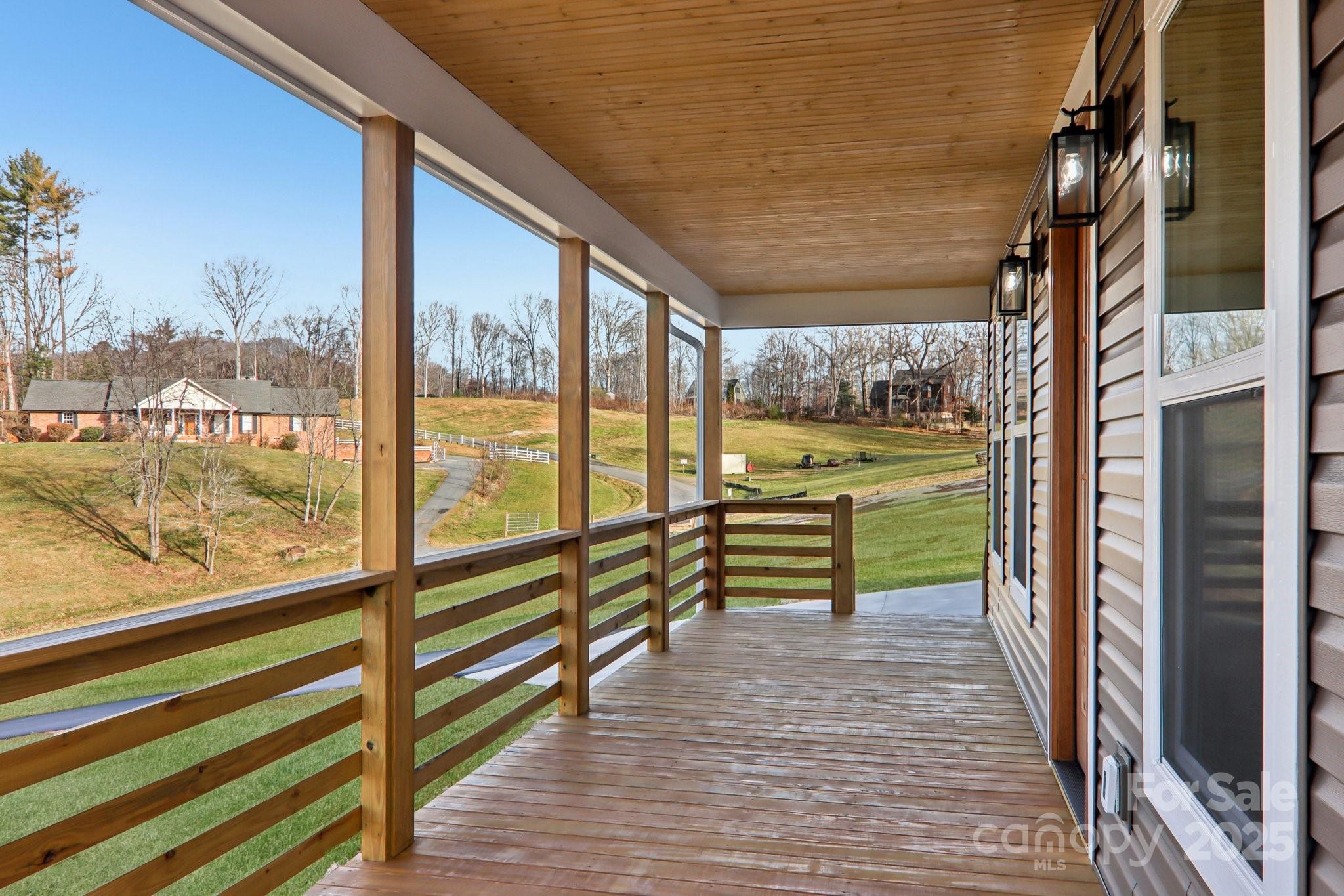 119 Lincoln Rdg Drive, Unit 1 Candler, NC 28715 - Photo 5 of 44 a view of railway station with sitting area