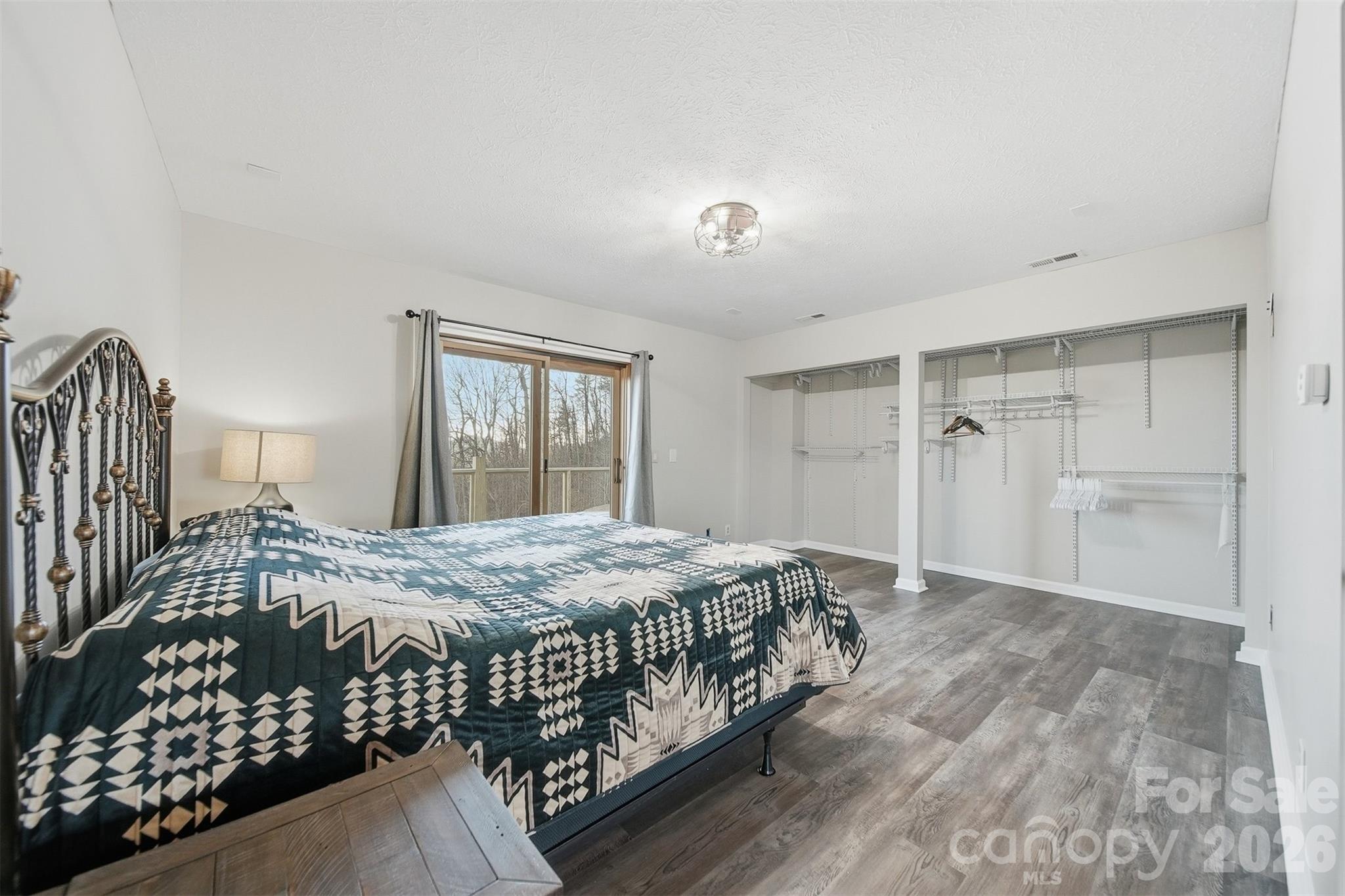 6500 Burkemont Road Morganton, NC 28655 - Photo 16 of 48 a bedroom with a bed and a window