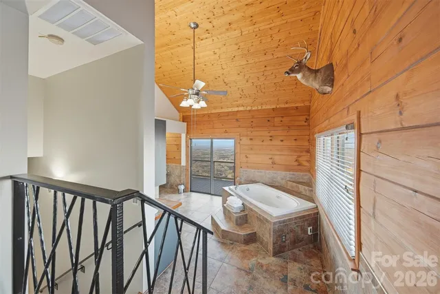 a view of balcony with furniture