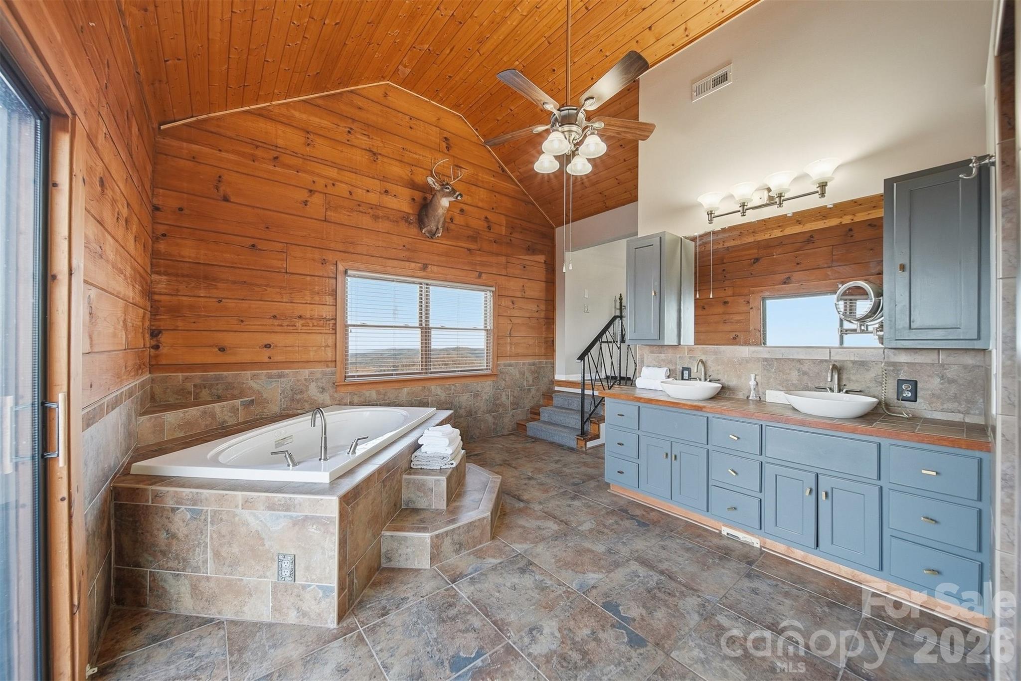 6500 Burkemont Road Morganton, NC 28655 - Photo 21 of 48 a spacious bathroom with a tub sink and mirror