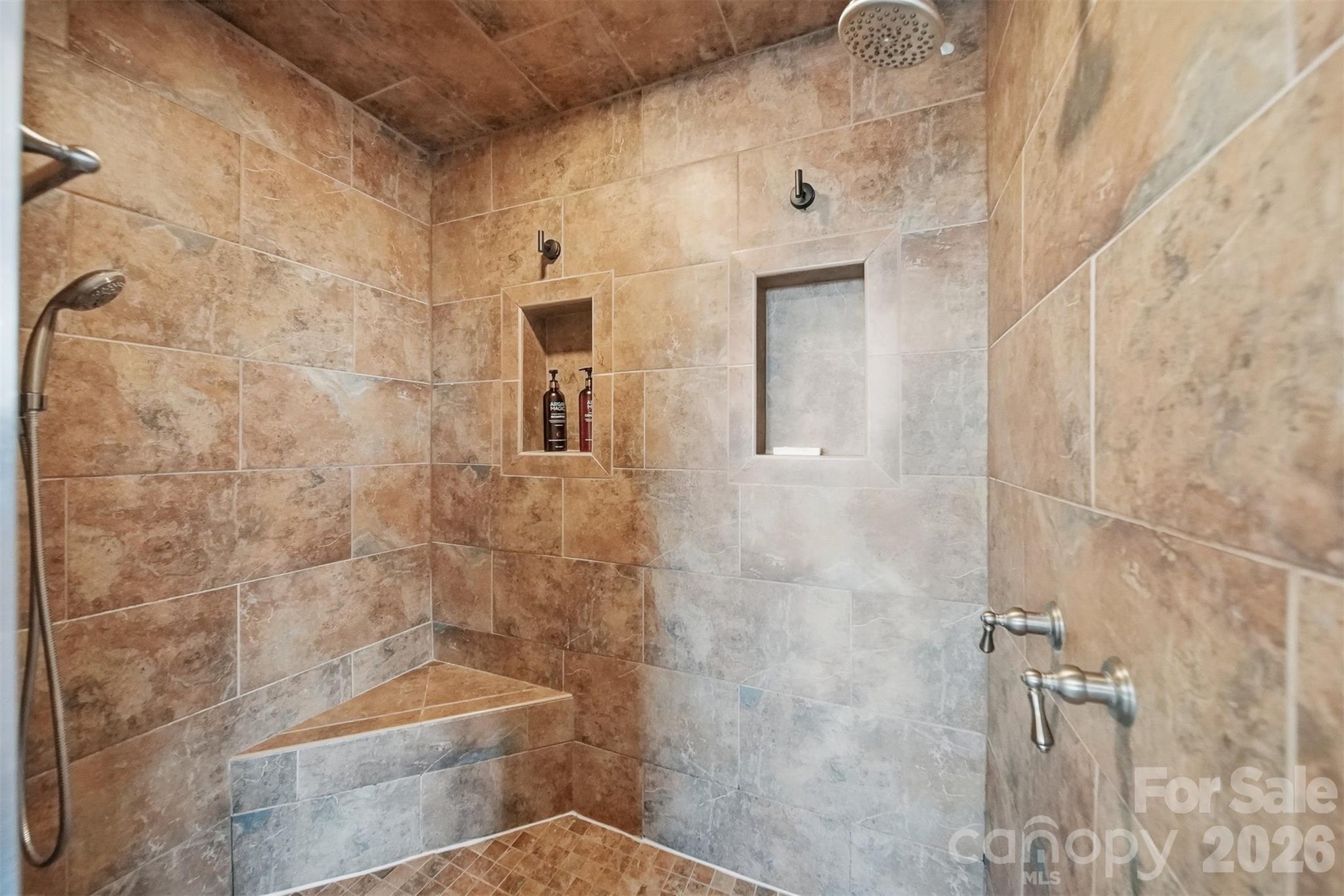 6500 Burkemont Road Morganton, NC 28655 - Photo 23 of 48 a bathroom with a toilet and shower