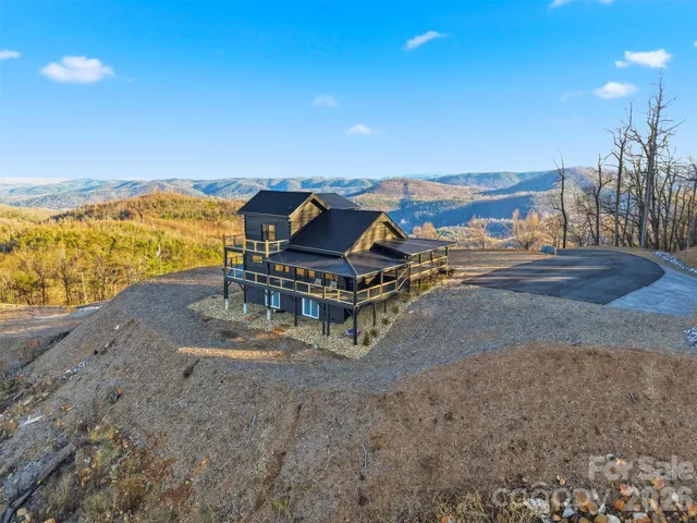 a house with trees in the background