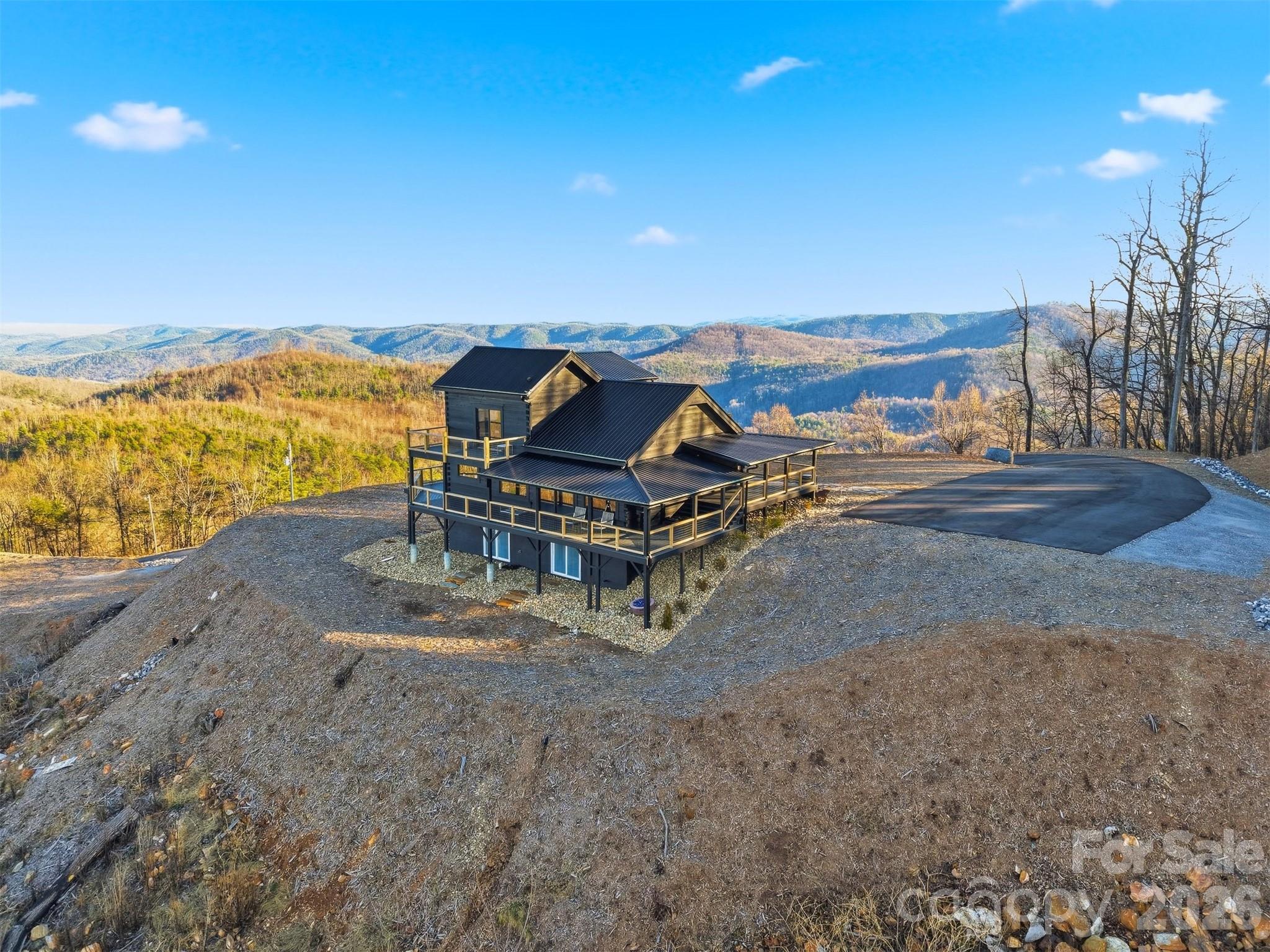 6500 Burkemont Road Morganton, NC 28655 - Photo 37 of 48 a view of a ocean with a mountain