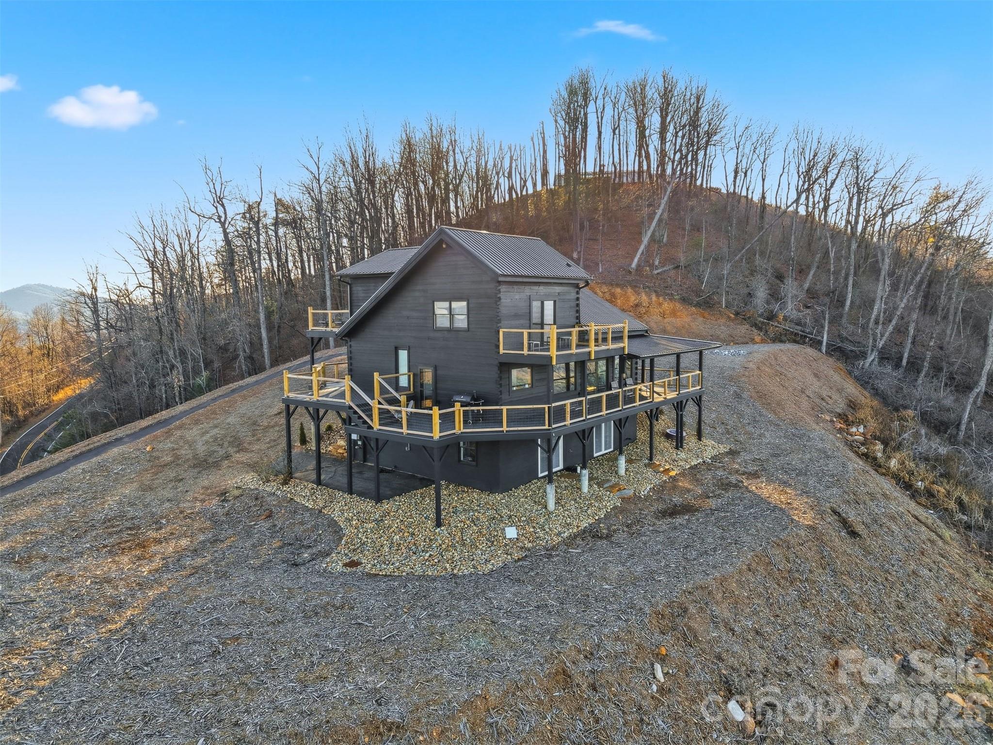 6500 Burkemont Road Morganton, NC 28655 - Photo 38 of 48 a house with trees in the background