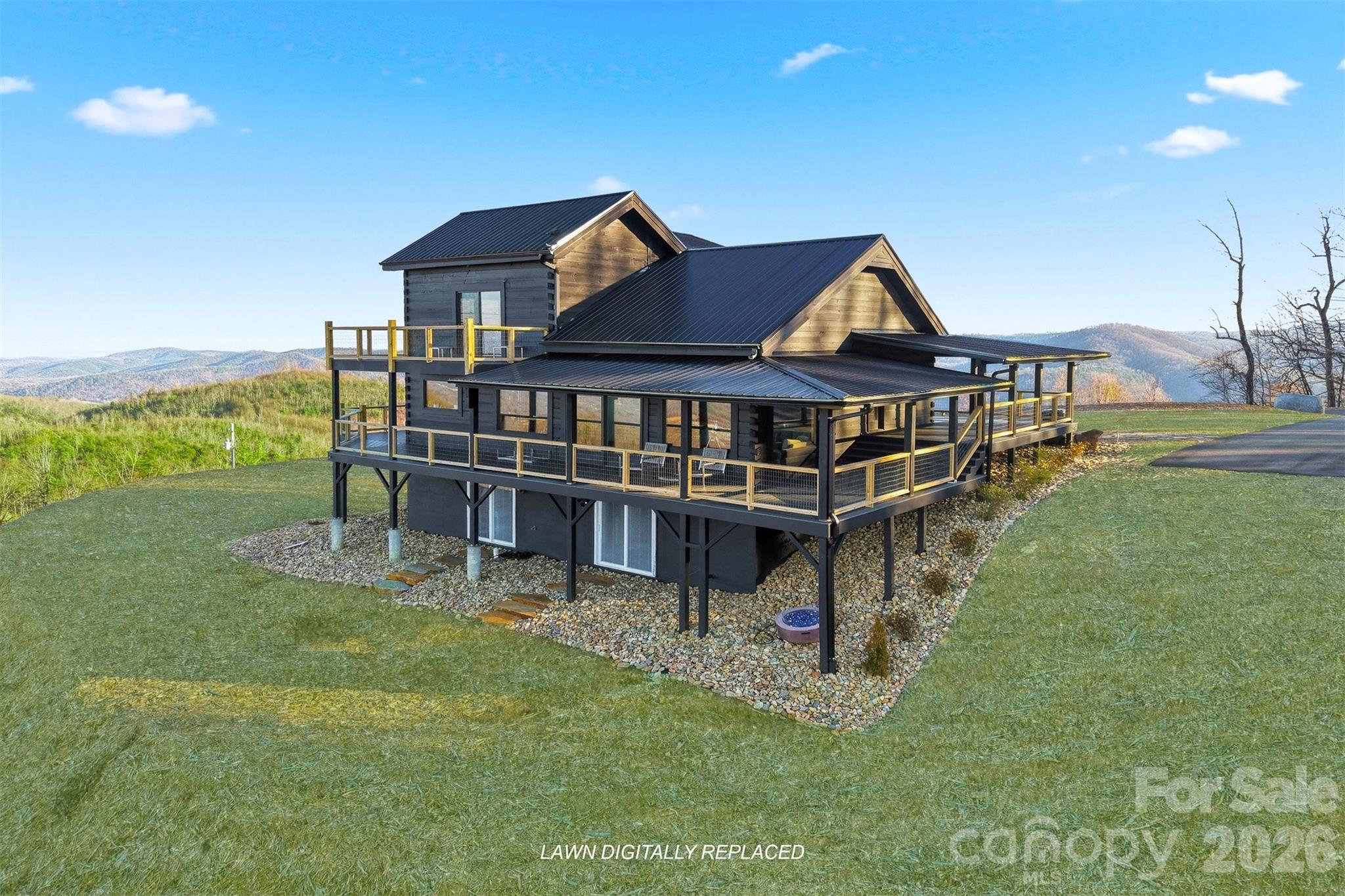 6500 Burkemont Road Morganton, NC 28655 - Photo 4 of 48 a view of a house with a yard and a slide