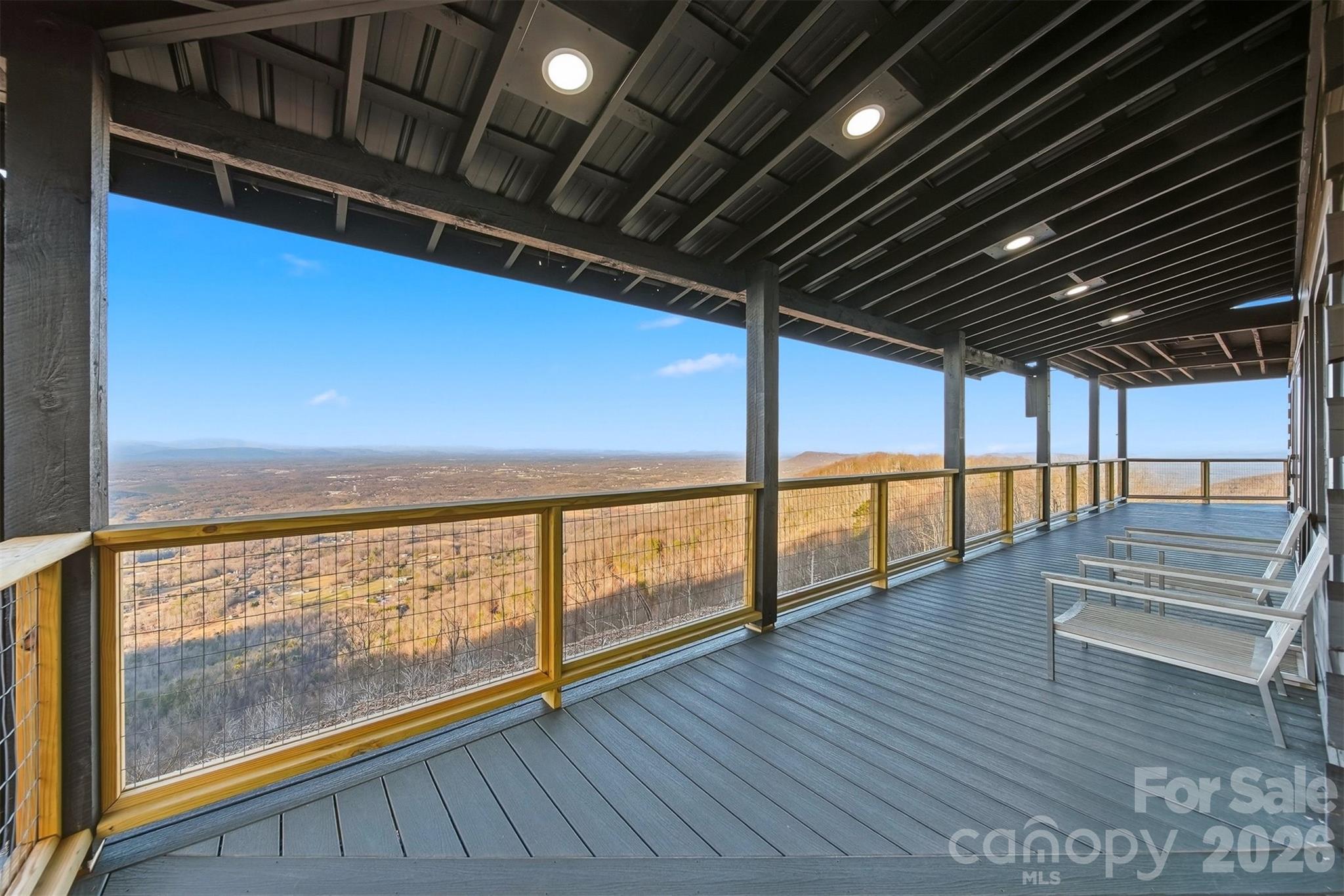 6500 Burkemont Road Morganton, NC 28655 - Photo 44 of 48 a view of an empty room with wooden floor