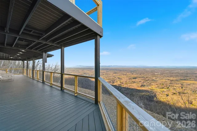 a view of balcony with furniture