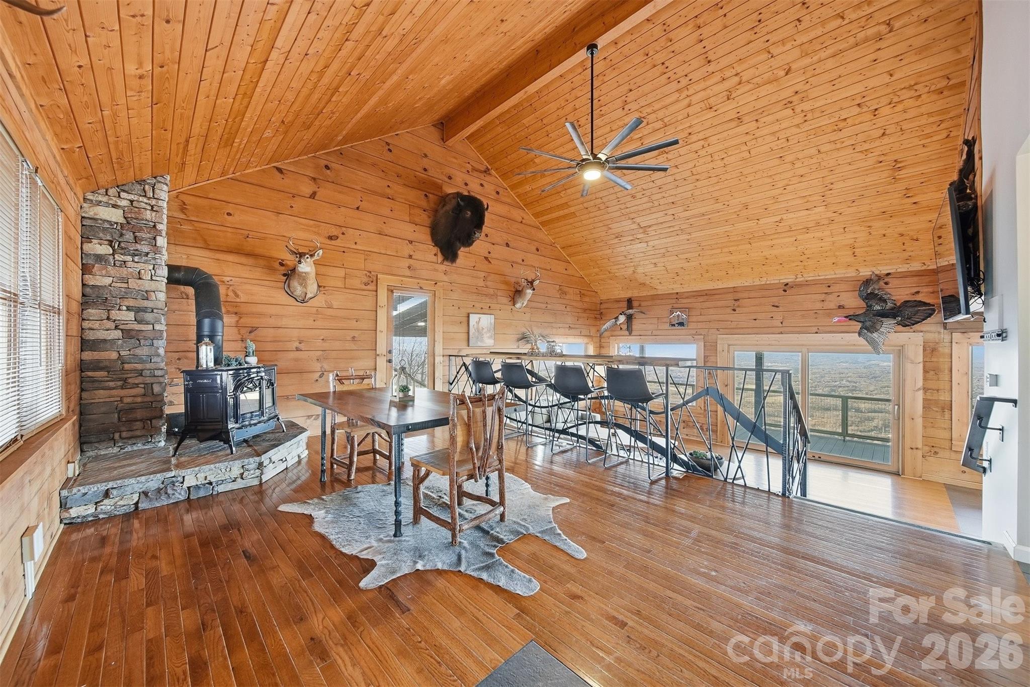 6500 Burkemont Road Morganton, NC 28655 - Photo 9 of 48 a view of a patio with a table and chairs