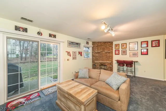 a backyard of apartments with large trees