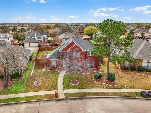 an aerial view of residential house with outdoor space