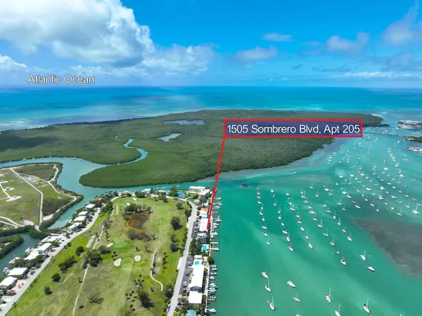 a view of a city with lawn chairs