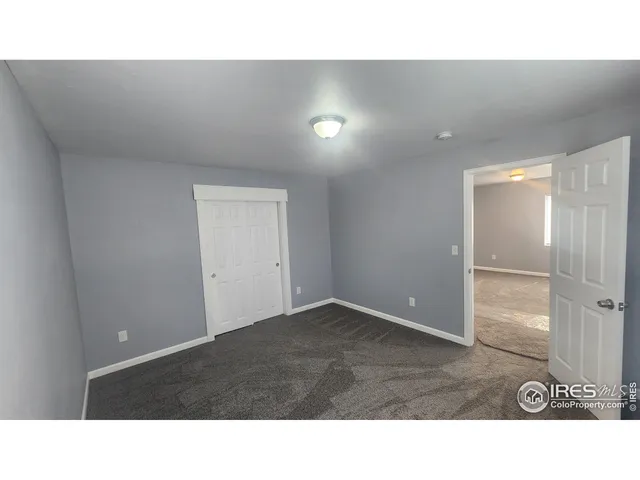 a open hall with a bench in it