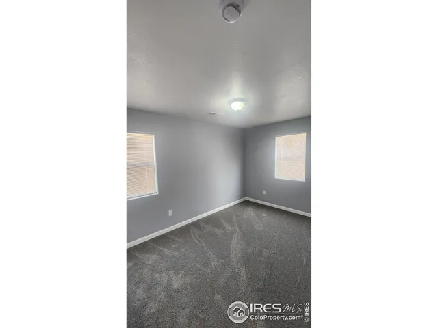 a bathroom with a toilet a sink and shower