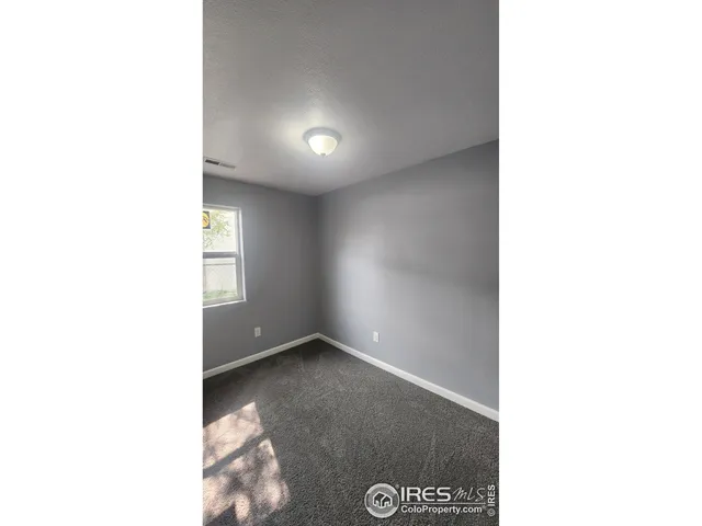 a living room with a couch and a table