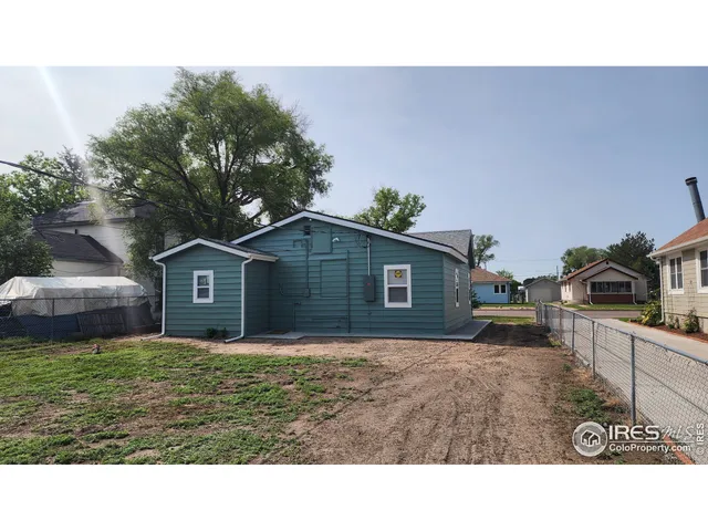 a black and white photo of a house