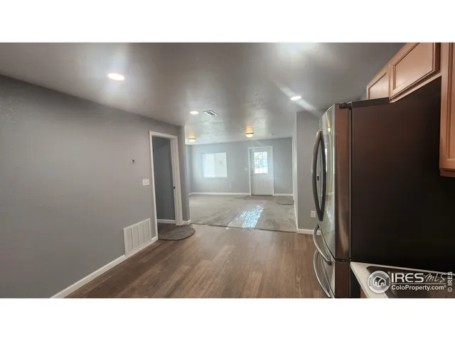 a open hall with a bench in it