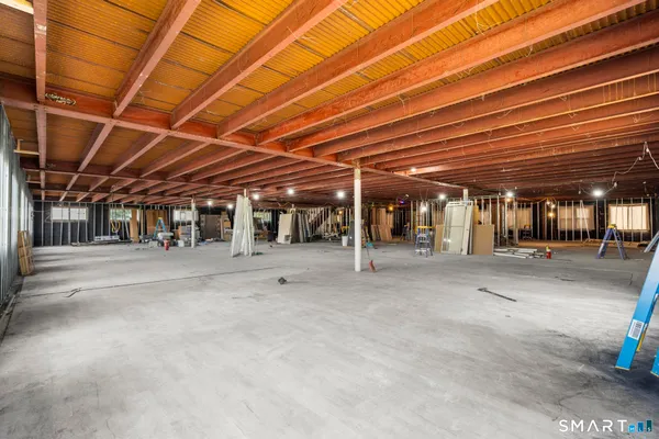 a view of a room with wooden walls