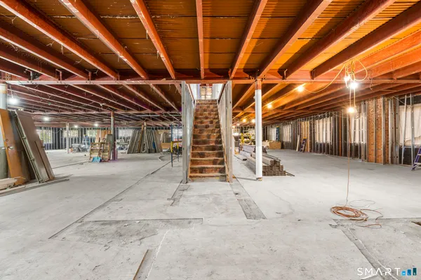 a view of a room with wooden walls
