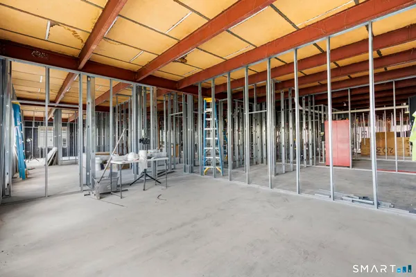 a view of an outdoor space with wooden walls