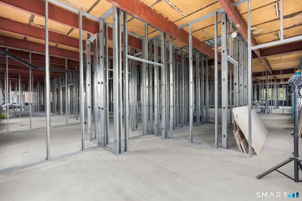 a view of patio with chairs and table in a patio