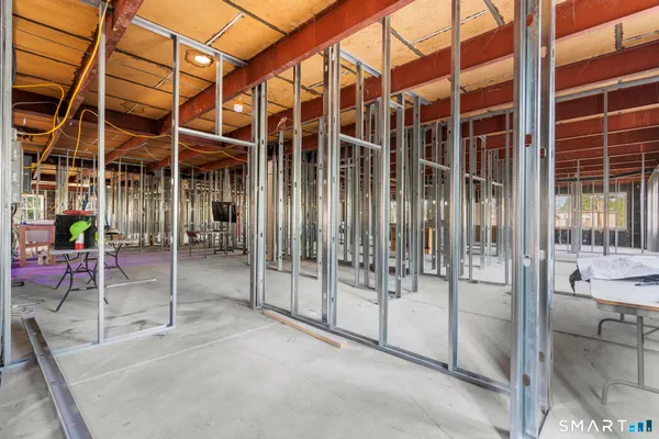 a view of front door with outdoor seating