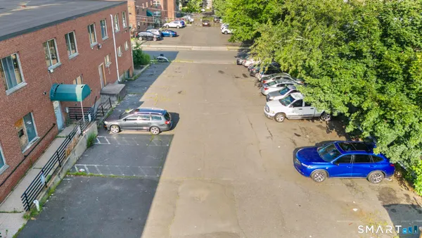 a view of street with an outdoor seating