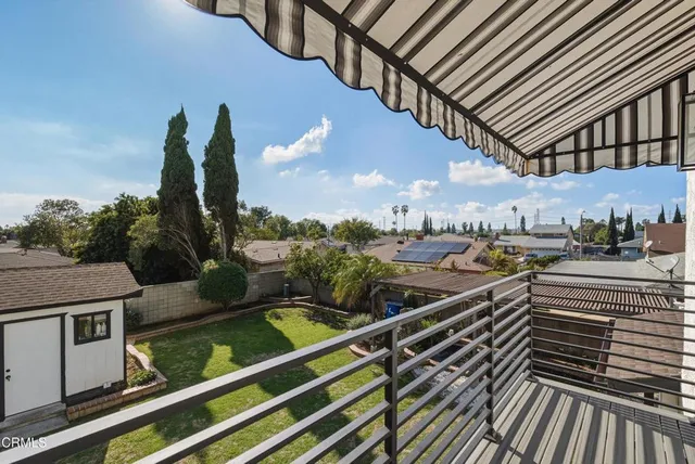a view of a balcony with an outdoor space