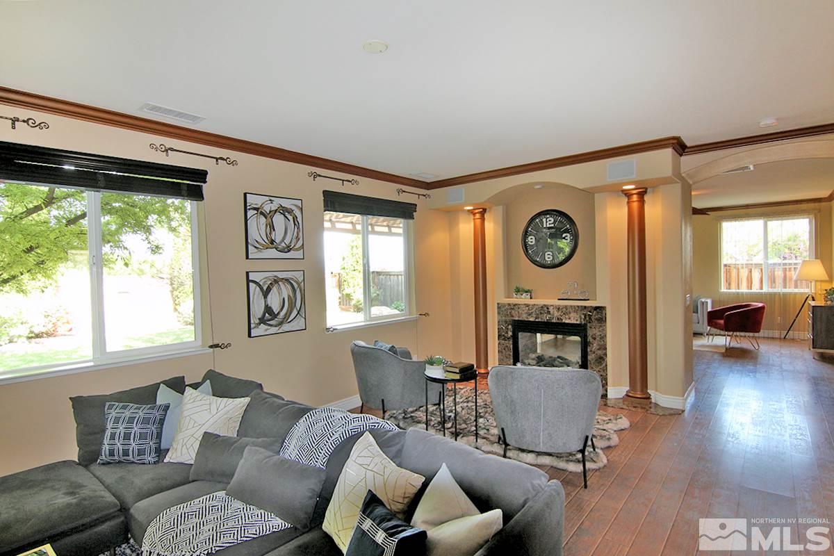 11205 Messina Way Reno, NV 89521 - Photo 14 of 40 a living room with furniture and a large window