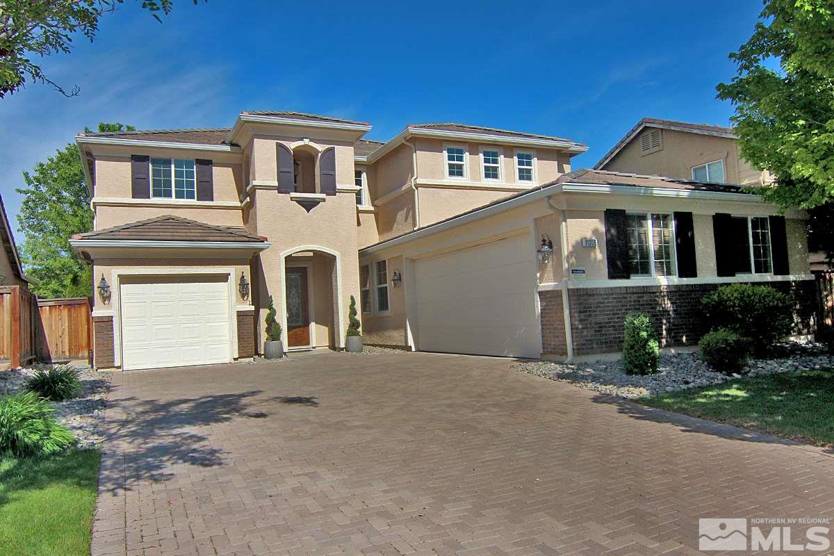 11205 Messina Way Reno, NV 89521 - Photo 2 of 40 front view of a house with a yard