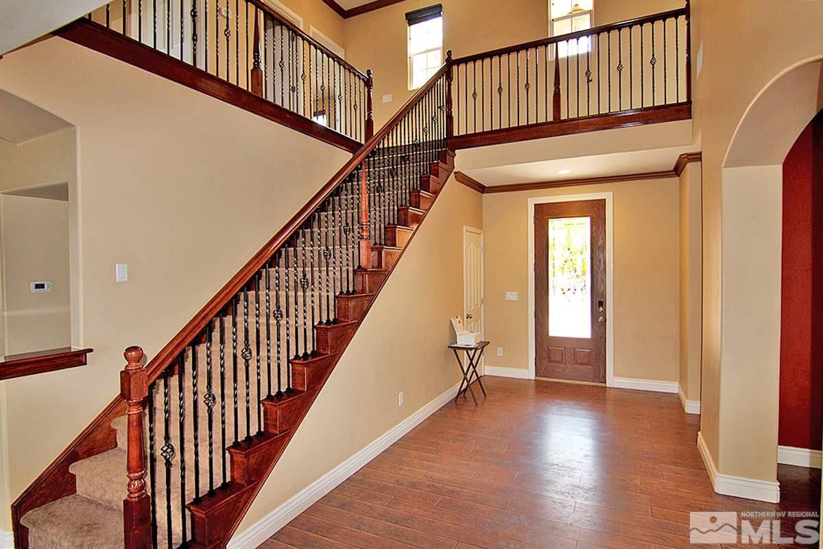 11205 Messina Way Reno, NV 89521 - Photo 23 of 40 a view of an entryway with wooden floor