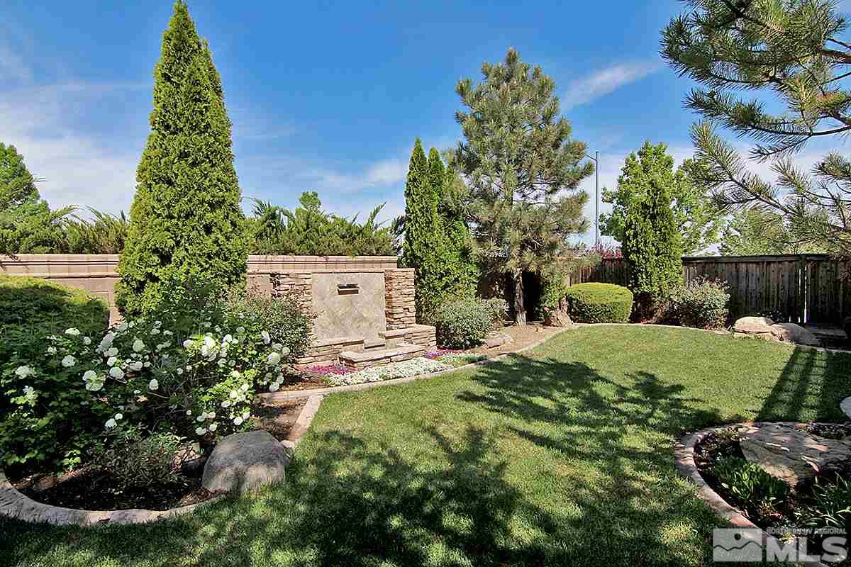 11205 Messina Way Reno, NV 89521 - Photo 38 of 40 a front view of a house with a yard