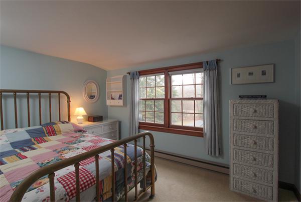 124 Miles River Road Hamilton, MA 01982 - Photo 15 of 22 a bedroom with a bed and a window