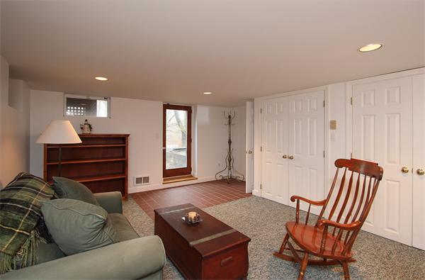 124 Miles River Road Hamilton, MA 01982 - Photo 18 of 22 a living room with furniture and a wooden floor