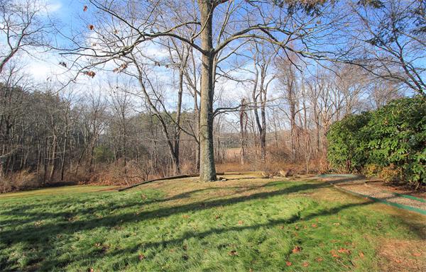 124 Miles River Road Hamilton, MA 01982 - Photo 22 of 22 a view of outdoor space with deck and yard