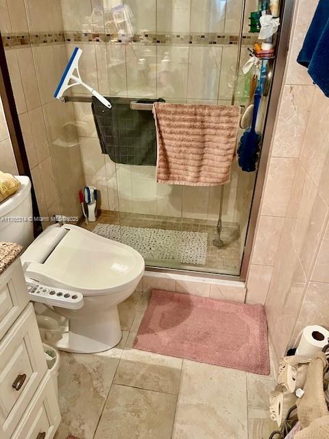 Boynton Beach Boynton Beach, FL 33435 - Photo 19 of 29 a bathroom with a toilet and a shower