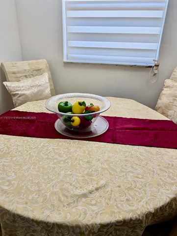 a bedroom with a bed and a table