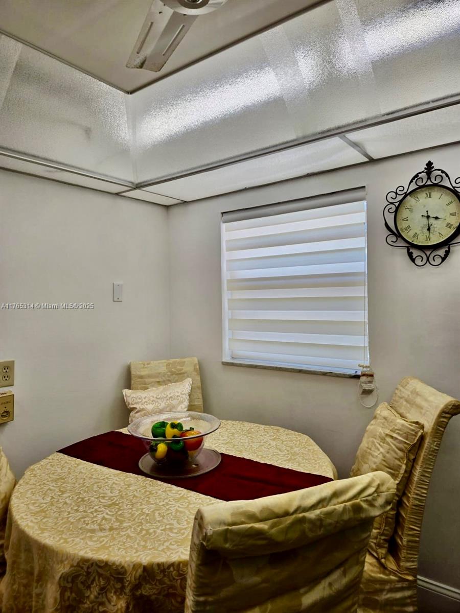 Boynton Beach Boynton Beach, FL 33435 - Photo 26 of 29 a bed sitting in a bedroom next to a window