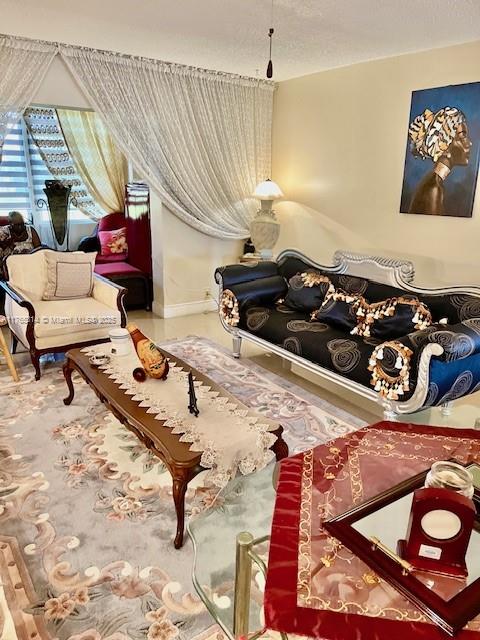 Boynton Beach Boynton Beach, FL 33435 - Photo 7 of 29 a living room with furniture and a rug