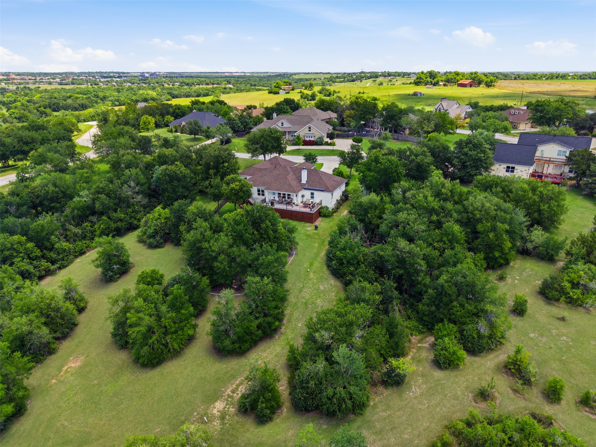 1804 Tanner Loop Taylor, TX 76574 - Photo 35 of 40 The land strikes the perfect balance with useful, open space and the right amount of tree coverage for privacy.
