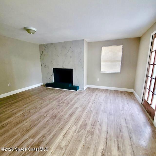 1510 Cambridge Drive Cocoa, FL 32922 - Photo 9 of 19 an empty room with wooden floor and windows